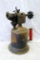 Brass blow torch will look great polished up. Plunger is disconnected from piston, but you're not