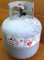 No shipping. Propane gas tank with new style head still has contents, weighs 26 lbs. Great to have