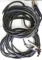 Two lengths of welding cable. First length is approx. 43' and has a ground clamp on one end; Second