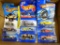 Nine Hot Wheels cars including Myers Max, '71 Plymouth GTX, Ferrari 360 Modena and more.