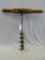 Vintage T-drill with original wooden handle. Measures 18'' long and 17 1/2'' across handle. Wood has