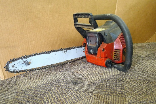 Jonsered Model CS2137 Turbo chain saw with 14" bar. Saw is light and has a shock absorbing handle