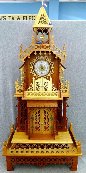 Wonderfully ornate clock is about 18" x 10" x 39" over flag. In good condition, clock may just need