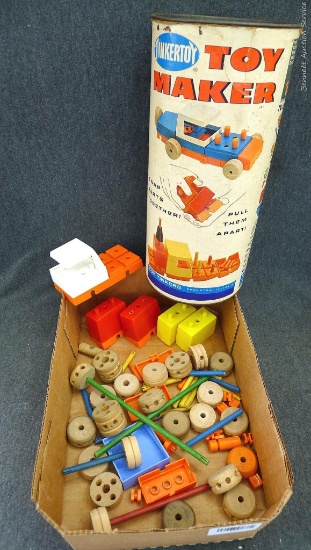 TinkerToy Toy Maker set. Pieces are in good condition. Comes with original toy container, 12''.