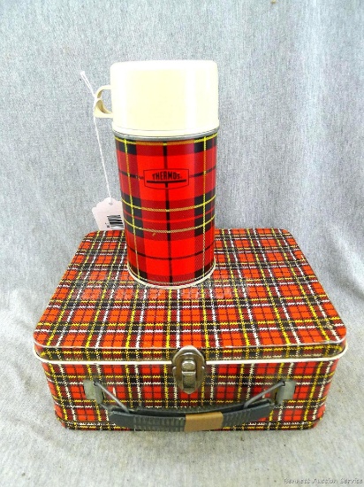 Classy vintage red plaid lunch box by Ohio Art and a similar red plaid Thermos. Lunch box is 9" wide