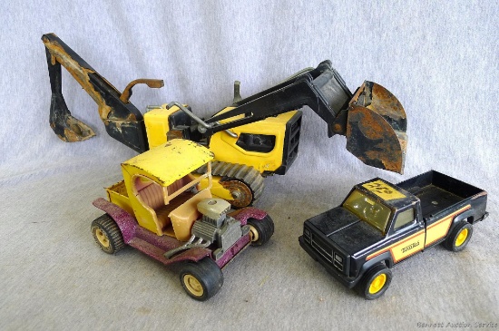 Tonka tractor and two trucks. Largest piece is 21" from bucket to back hoe.