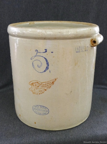 Red Wing 5 gallon large wing stoneware crock has some cracks noted. Would make a great planter.