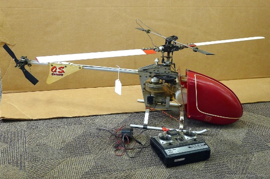 Futaba Conquest FP-T5NLH FM radio controller with a O.S. Engine helicopter. Helicopter body is 42"