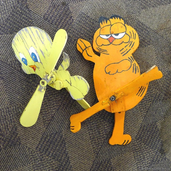 Garfield and Tweety Bird whirly-gigs in overall good shape. Garfield is approx. 20" overall.