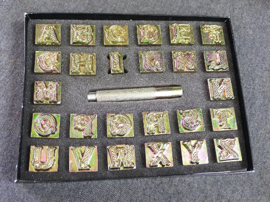 Leather alphabet stamp set with handle. Each letter is approx. 1-3/4".