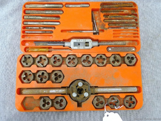 Most of a tap and die set, plus some extras. Largest pieces are 1/2" thread.