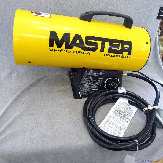 Master 60,000 BTU propane powered heater, model no. MH-60V-GFA-A . Hose and cylinder are in nice
