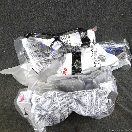 Six pair of safety glasses by 3M and others.