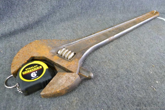 18" Craftsman adjustable wrench opens to nearly 2-1/4".