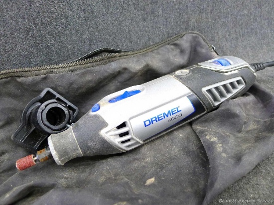 Dremel Model 4000 variable speed rotary tool. Runs and has nice long cord. Tool about 10" long and