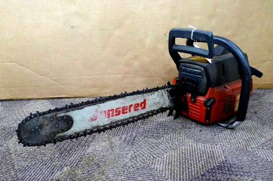 Jonsered 670 Champ chainsaw runs and has a 20" bar.