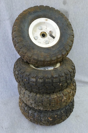 Four tires with rims, 4.10350-4