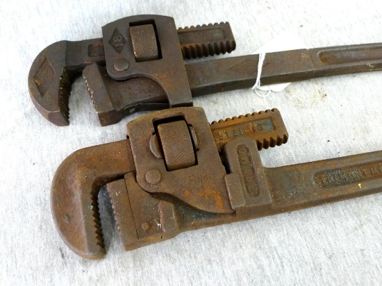 Trimont and Stillson 18" pipe wrenches. One handle is straight, one set of jaws is good.