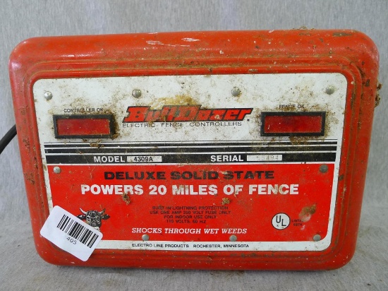 Bull Dozer Deluxe Solid State fencer powers 20 miles of fence. Model 4309A. Measures about 11" x 8"