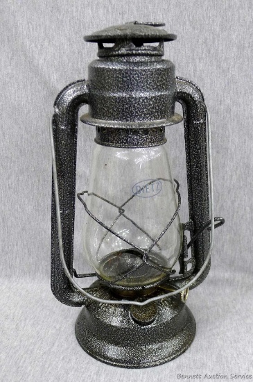 Dietz kerosene lantern with hammered metal finish; measures 12" tall. No cracks or chips noted on