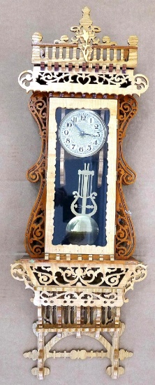 Beautiful ornate wall clock with scroll work; measures 11" x 5" x 30" tall. May need new battery.