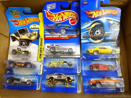 Nine Hot Wheels cars including Myers Max, '71 Plymouth GTX, Ferrari 360 Modena and more.