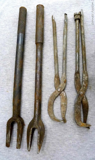 Two ball joint forks and two brake tools.