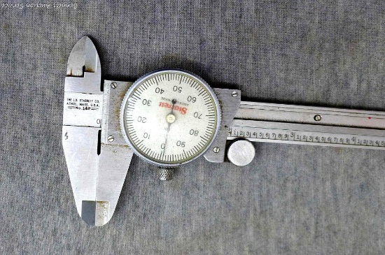 Starrett 9" hardened stainless steel dial caliper Model 120 with .100 dial and .001 graduations.