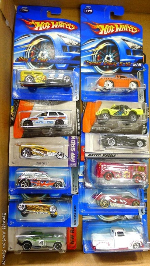 Two Matchbox cars and 10 Hot Wheels cars including RRRoadster, La Troca, '58 Corvette and more.