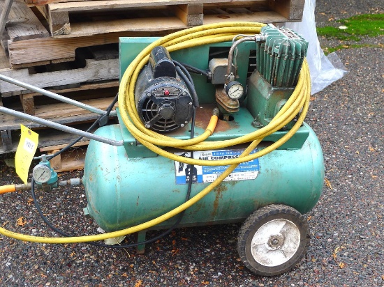 Two hp, 230 volt, twin cylinder air compressor, tank is approx 31'' x 14''. Seller notes compressor