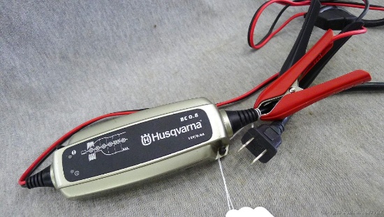 Husqvarna 12V/0.8A charger for 12V batteries, leads and cord are each about 6' long.