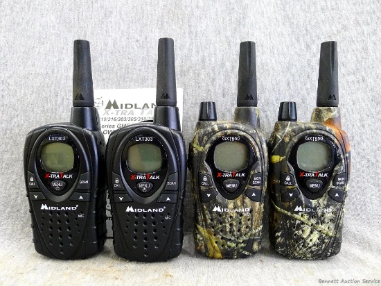 Midland X-tra Talk radio's, 2 model LXT303 and 2 GXT650. All 4 power up and displays work and