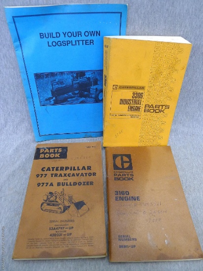 Three Caterpillar parts books and "Build Your Own Logsplitter" book.