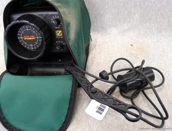 Zercom Marine Color Point three-color ice flasher in case; measures 8" x 10" x 8" tall. Includes