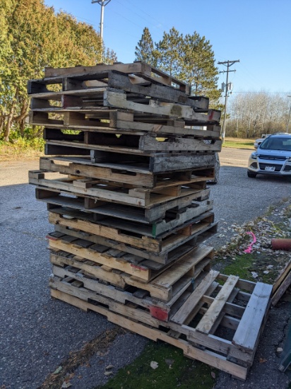 Pile of hardwood and softwood pallets, is approx 5' tall. Most pallets are around 48'' x 40'' , some