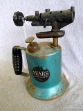 Vintage Sears blowtorch with original handle and knob. In good condition with some light rusting.