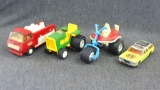 Tonka 4'' x 3'' toy tractor, Tonka 6'' x 2'' toy firetruck, Tonka 5'' x 3'' toy trike, and matchbox