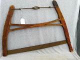 Nice Buck Saw, blade measures about 28''. Wooden handles are in nice shape.