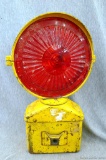 Dietz Visi-flash hazard light with hooded red lens. Unit measures 13