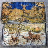 Two wall tapestries with deer scenes. In decent shape with some staining to tapestries. Largest