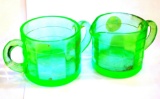 Uranium Depression glass creamer and sugar, both glow under a black light. No chips or cracks noted.