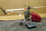 Futaba Conquest FP-T5NLH FM radio controller with a O.S. Engine helicopter. Helicopter body is 42