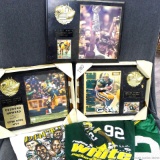 Brett Farve, Reggie White, and Desmond Howard plaques; plus Number 92 Reggie White jersey, Reggie