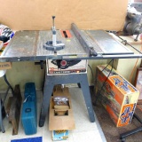 Craftsman 10'' table saw with adjustable fence and miter gauge. Saw runs, steel table is in nice