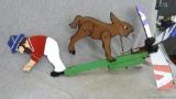 Funny moving whirly gig, measures 24'' overall. Spins nicely
