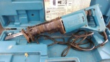 Makita corded reciprocating saw, model no. JR3000V. Runs and measures 20'' overall