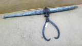 Antique swiveling log tongs have a 21