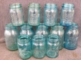 Vintage blue quart and pint sized Ball canning jars.