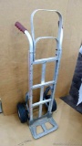 Magliner hand cart is nice and light for easy moving. Has slides for going up stairs. Hand truck