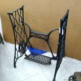 Antique cast iron Singer treadle sewing machine base is about 22
